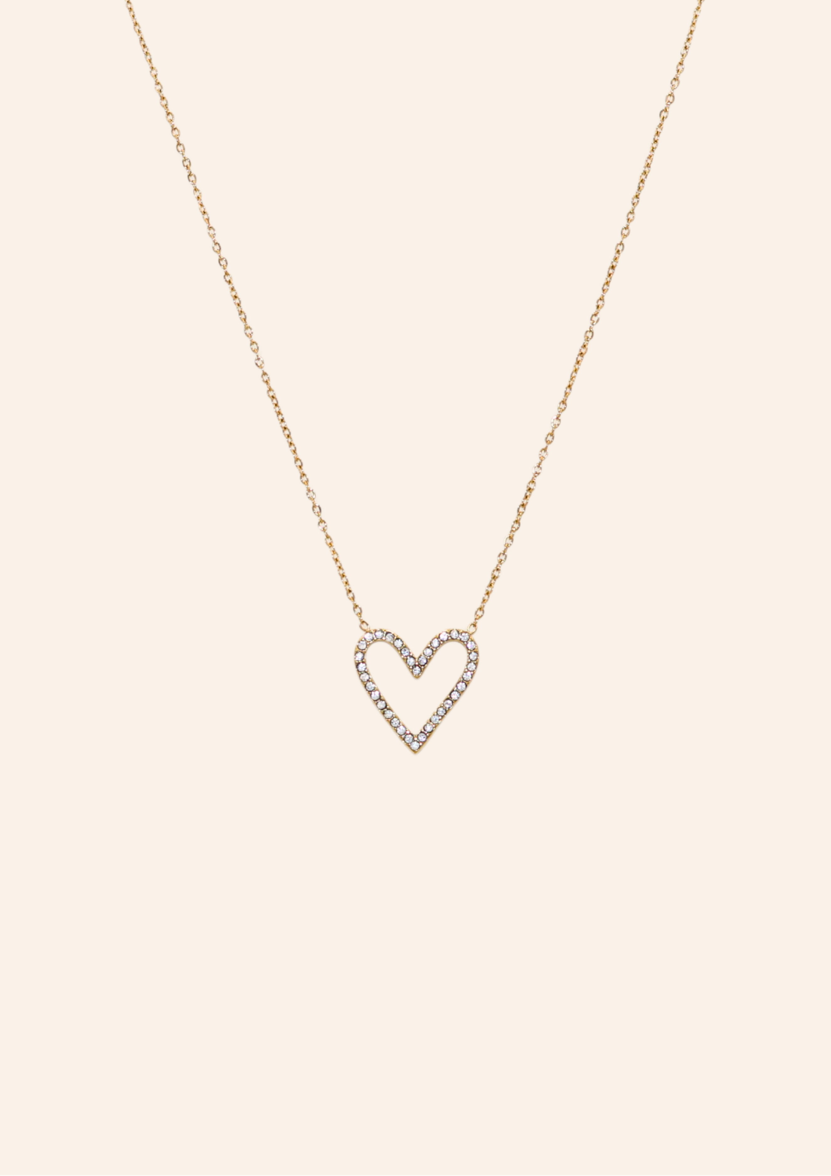 Gouden ketting van roestvrij staal met een glitter hartje. Verkrijgbaar op izzithelabel.nl. De ketting verkleurt niet door water en is stainless steel en nikkelvrij.