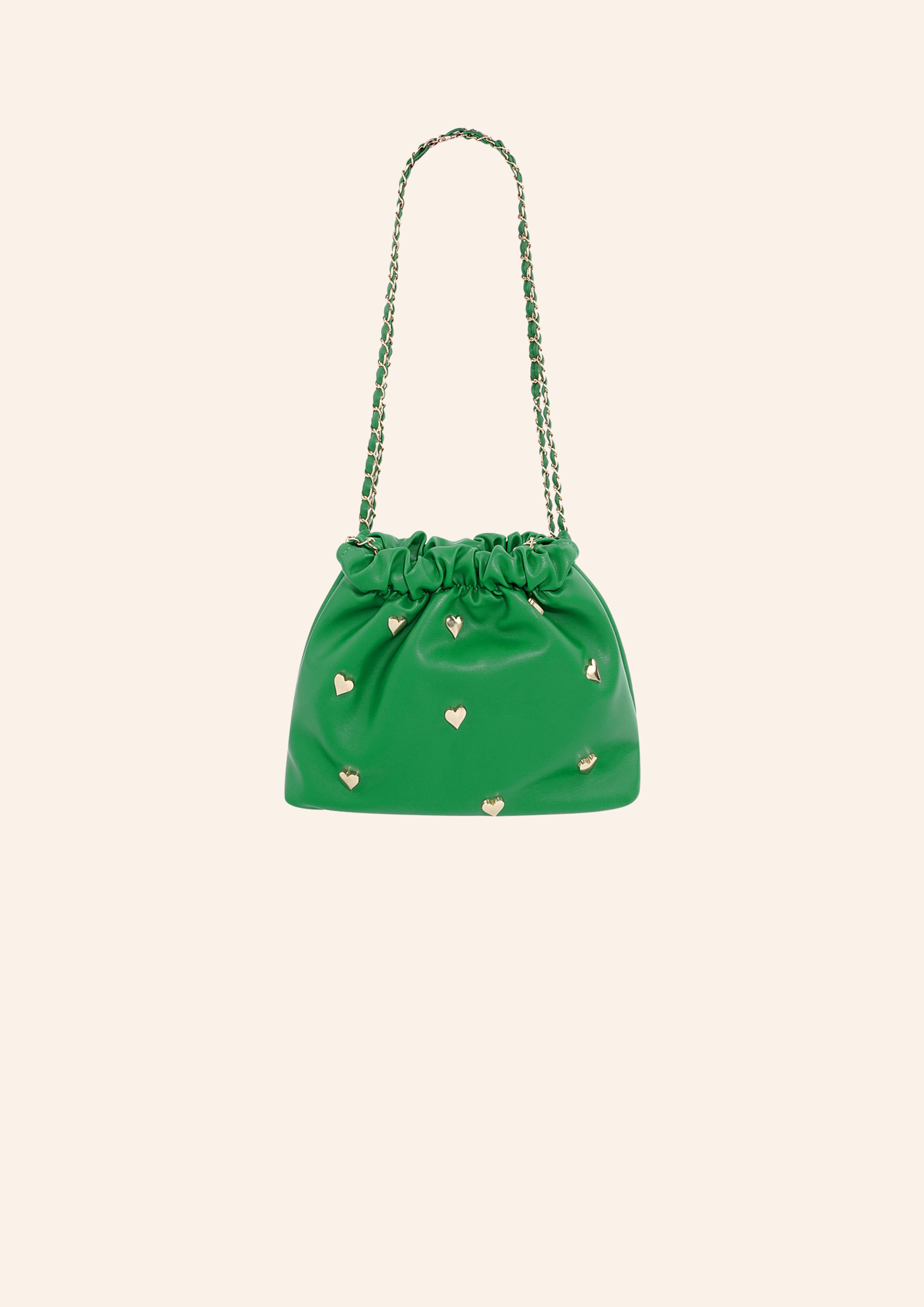 Groen kleurige schoudertas met hartjes studs. De tas heeft een leather look en heeft een druksluiting. Wordt verkocht op izzithelabel.nl.