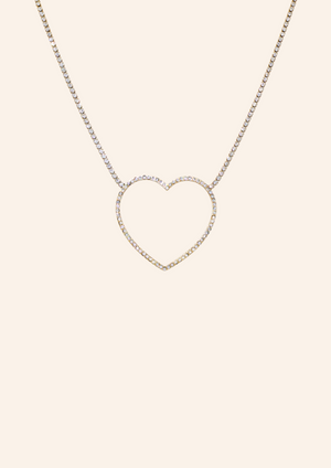 Gouden ketting van roestvrij staal met statement hart en glitter strass. Verkrijgbaar op izzithelabel.nl. De ketting verkleurt niet door water en is stainless steel en nikkelvrij.