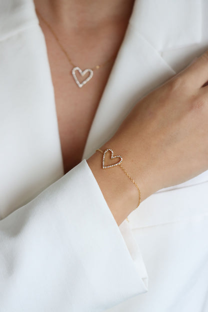 Fijne gouden armband met hartbedel, waterproof en hypo-allergeen.