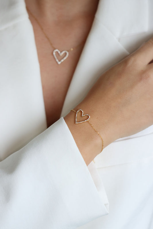 Fijne gouden armband met hartbedel, waterproof en hypo-allergeen.