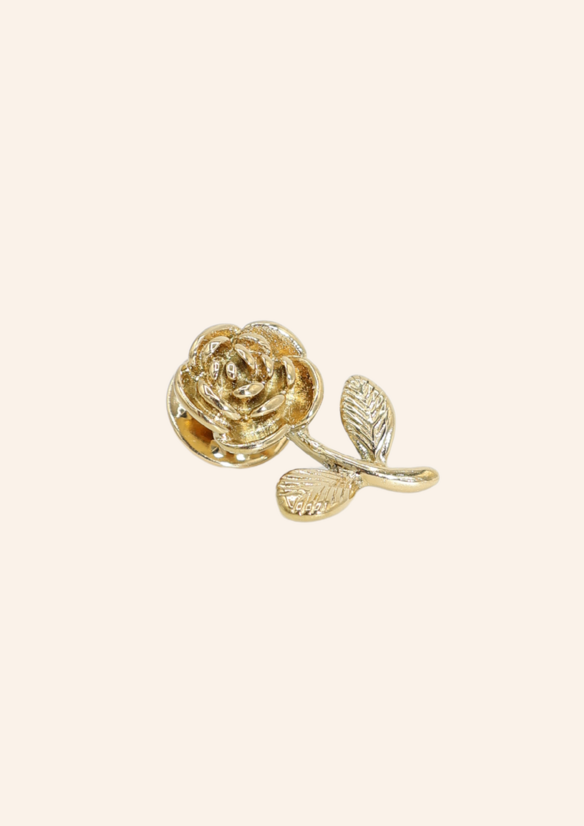 Gouden broche in de vorm van een roosje. Gemaakt van stainless steel