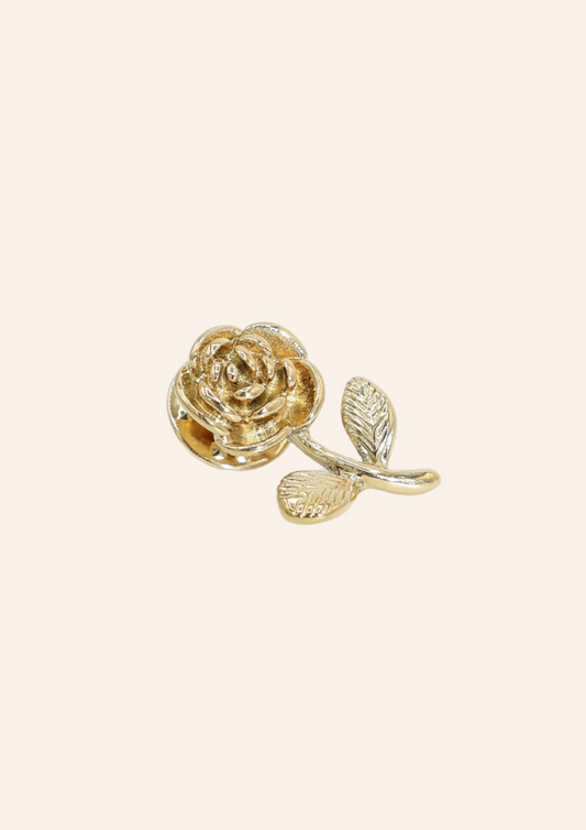 Gouden broche in de vorm van een roosje. Gemaakt van stainless steel
