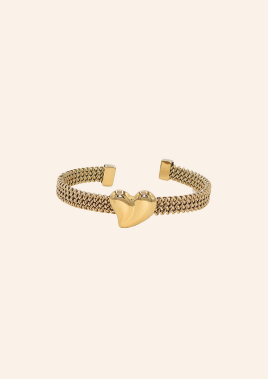 Gouden Bangle gemaakt van stainless steel dus is waterproof en hypo-allergeen.