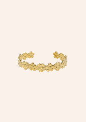 Chunky gouden Fancy Flower bangle gemaakt van stainless steel dus is waterproof en hypo-allergeen.