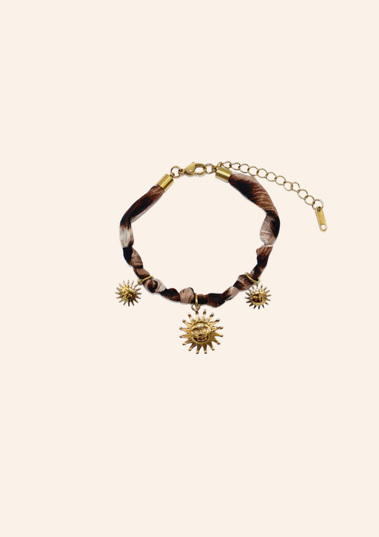 Gouden bedel armband van tijgerstof. Gemaakt van stainless steel dus is waterproof en hypo-allergeen.
