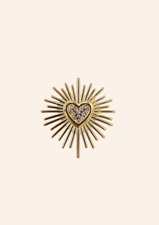 Gouden broche in de vorm van een hartje. Gemaakt van stainless steel